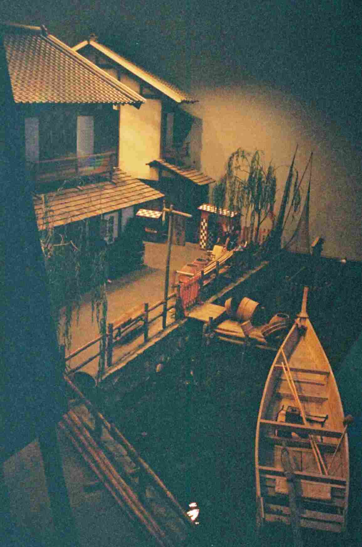 A boat in the canal at dusk